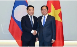 Phó Thủ tướng Chính phủ Bùi Thanh Sơn làm việc với Phó Thủ tướng Lào Saleumxay Kommasith