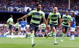 Man City hơn Arsenal bốn điểm