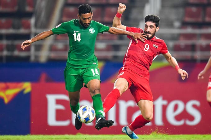 Dù thua U23 Saudi Arabia nhưng U23 Syria (áo đỏ) vẫn có vé vào tứ kết